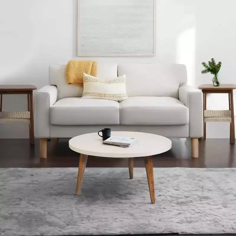 Table basse moderne ronde plateau blanc cassé pieds coniques en bois de manguier marron Marron/Blanc